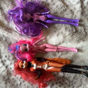 Trio of Vibrant Dolls with Colorful Hair